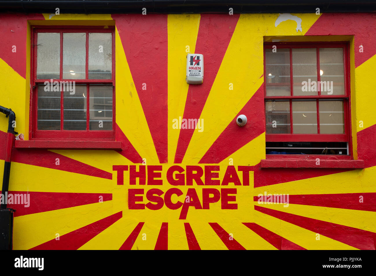 Esterno parete dipinta del 'grande fuga' negozio di musica in Brighton, Regno Unito Foto Stock
