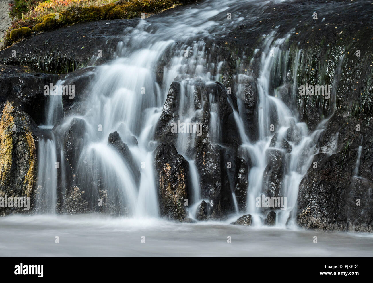 L'Islanda, la velata cascata Barnafoss, dettaglio autunno Foto Stock