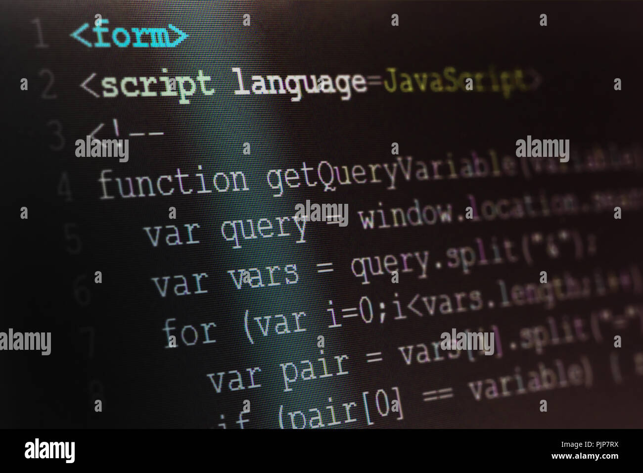 Close up macro shot messa a fuoco selettiva di java script linguaggio di programmazione sullo schermo del computer. Foto Stock