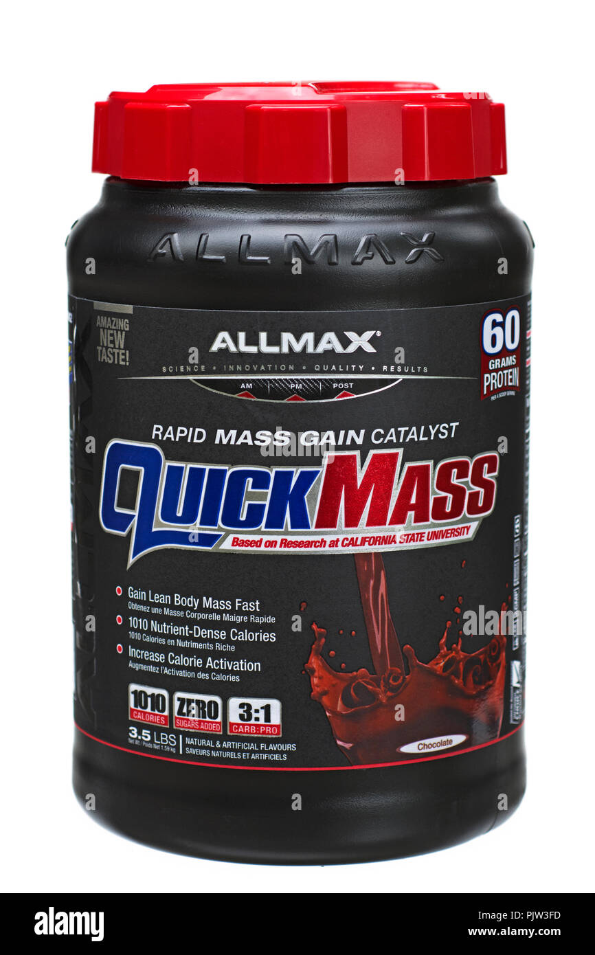 Mass Gainer proteine in polvere mescolare lo stagno, un vasetto di rapida messa in polvere Peso Gainer utilizzati dagli atleti, culturisti, Weightlifters Foto Stock
