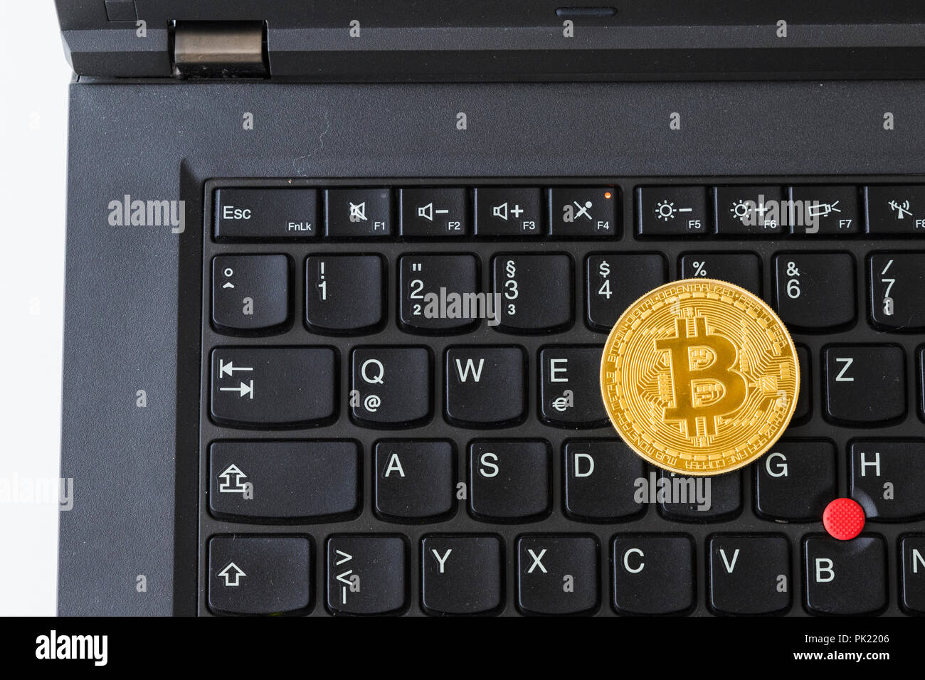 Un Bitcoin Cryptocurrency Bit digitale medaglia BTC valuta la tecnologia Internet Business concetto. Foto Stock