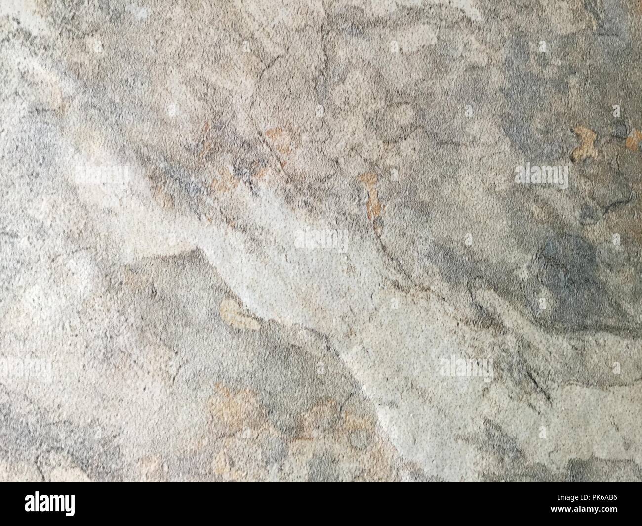 Liscia superficie di roccia sfondo grigio, marrone, dieci e colorazione bianca. Foto Stock