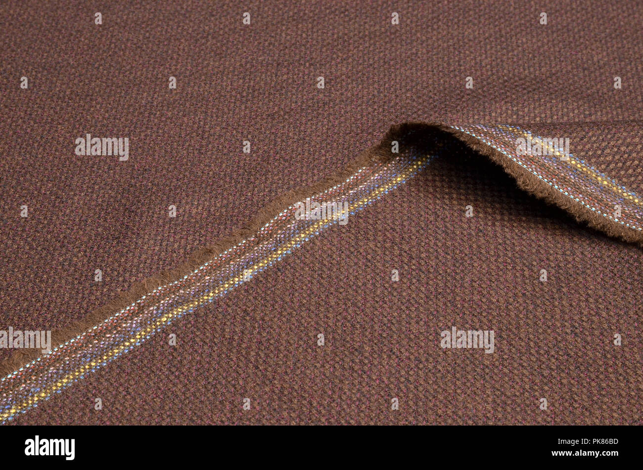 Tuta tessuto, tweed borgogna-marrone di lana. Foto Stock