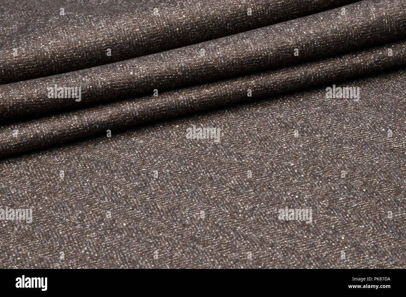 Tuta tessuto, tweed è di colore bruno-grigio di lana Foto stock - Alamy
