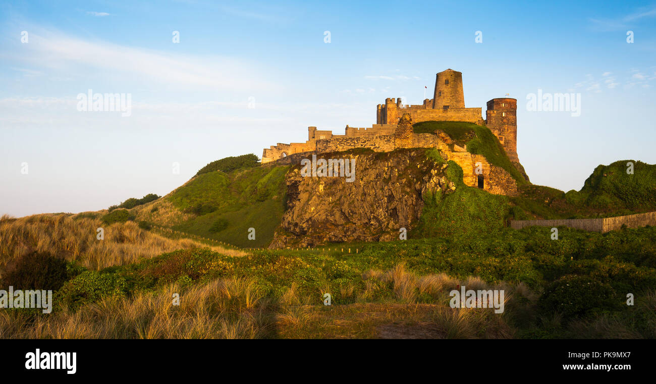 Il castello di Bamburgh, Bamburgh, Northumberland, Regno Unito Foto Stock