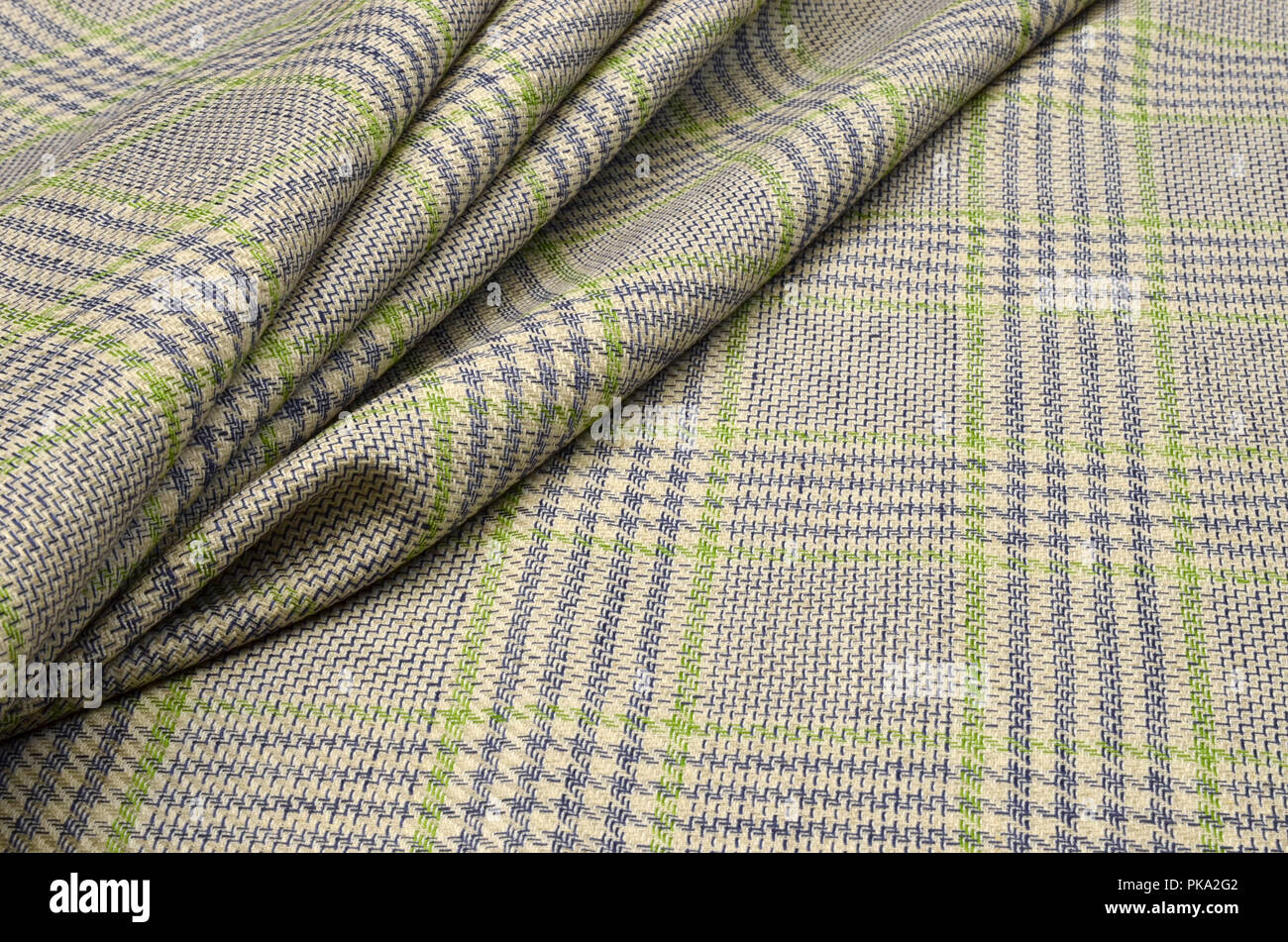 Stoffa di cotone, lino e elastan colore blu-verde sulla luce beige, costume Foto Stock