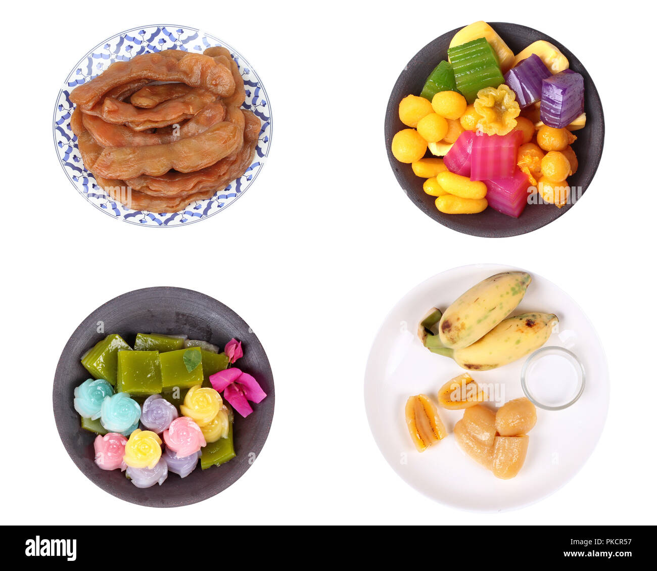Isolato di miste di popolare Traditioanal Thai dessert come tamarindo dolce Pickle,vaporizzato layer cake,bollito di banana in sciroppo e assiemi di banana con cocon Foto Stock