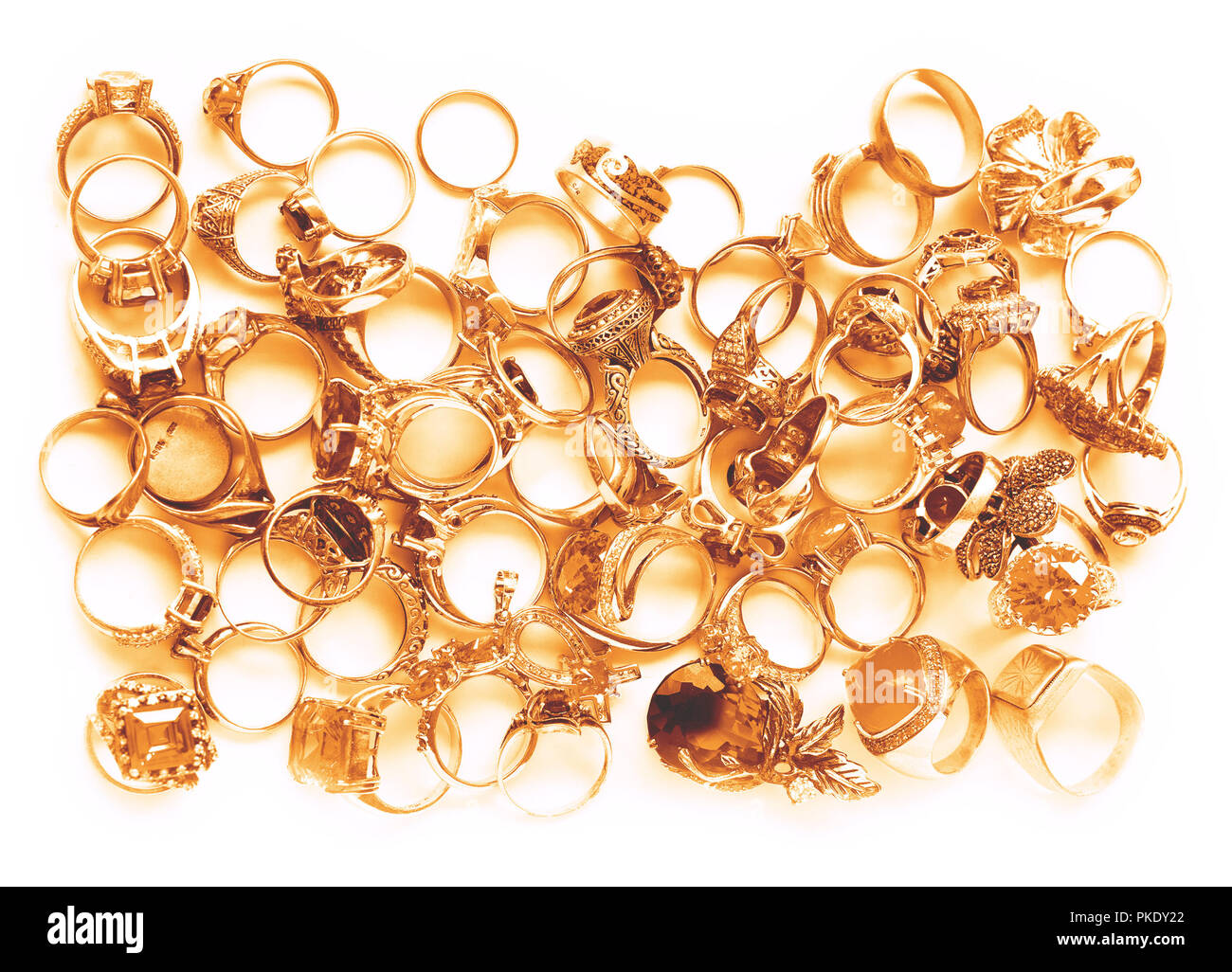 Golden anelli su bianco Foto Stock