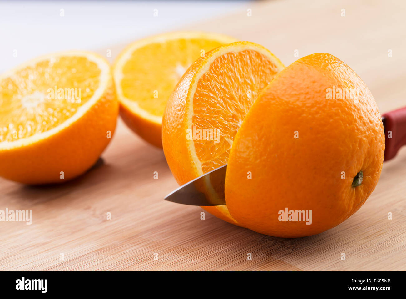 Tagliare la orange Foto Stock