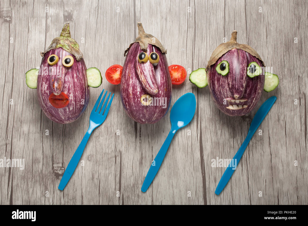 Idea creativa per rendere divertente facce con le melanzane Foto Stock