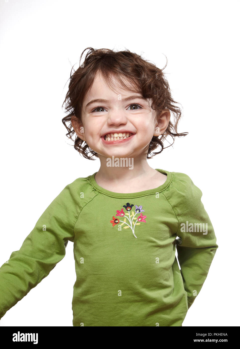 Toddler sorridente su sfondo bianco Foto Stock