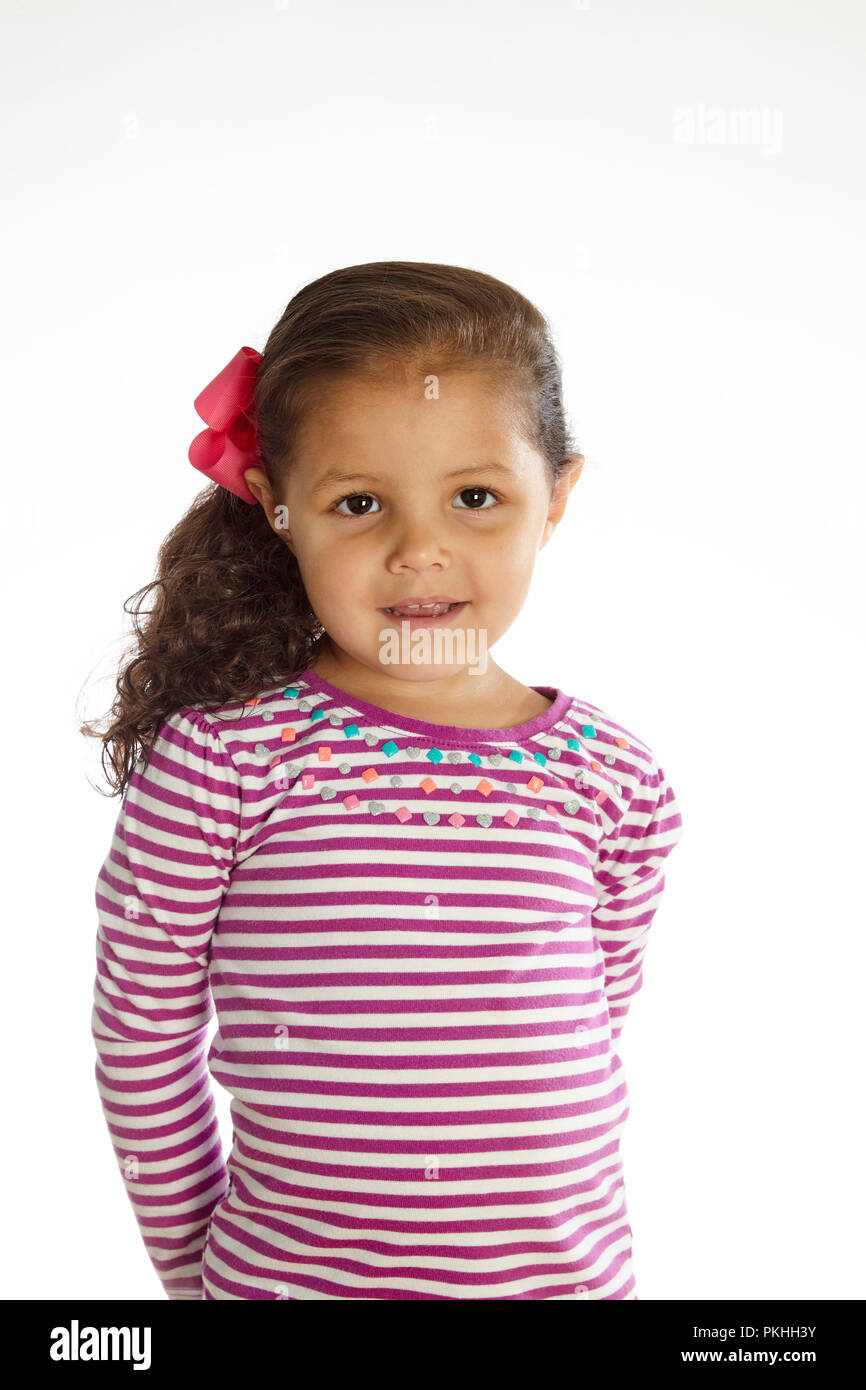 Carino bambina su sfondo bianco Foto Stock