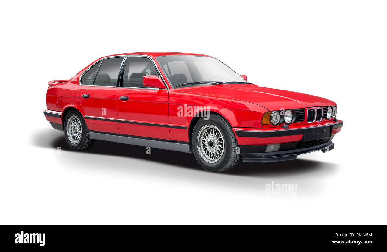 Red BMW serie 5 vista laterale su sfondo bianco Foto Stock