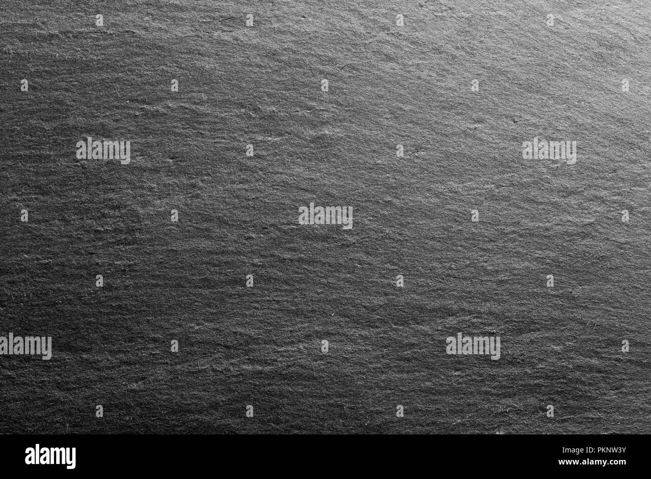 Nero ardesia rock per lo sfondo o la trama. Foto Stock