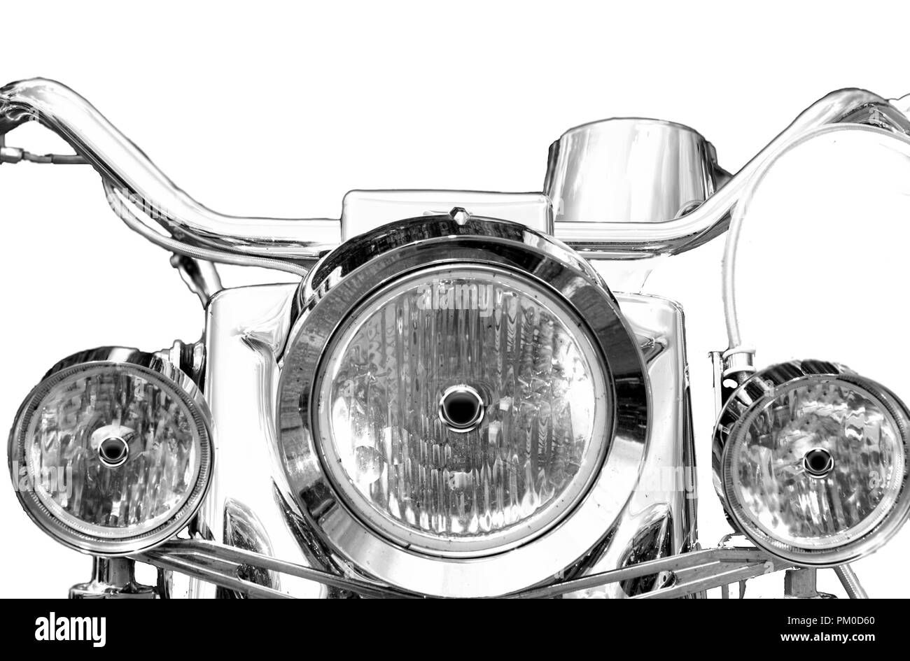 Primo piano della motocicletta fari, casco in bianco e nero. Foto Stock