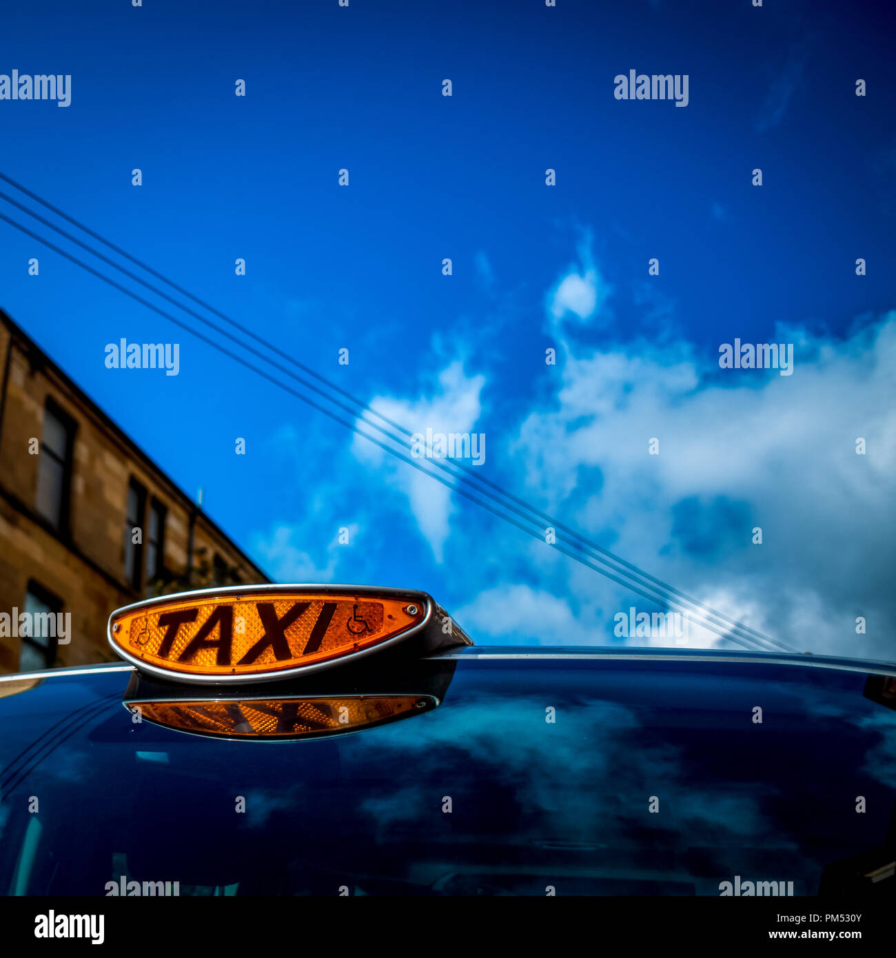 Close-up di un Taxi in luce una cabina a Glasgow, Scotland, Regno Unito Foto Stock