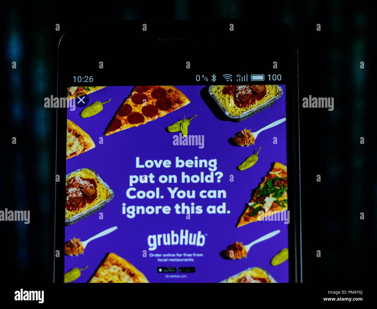 Grub Mozzo visto pubblicità visualizzata su uno smart phone. Mozzo di Grub Inc. è un on line e cibo mobile-società di ordinazione che collega diners con ristoranti locali. In base a Chicago, la società ha più di 14 milioni di active diners e circa 80.000 ristorante partner in oltre 1.600 città attraverso gli Stati Uniti e il Regno Unito. Foto Stock