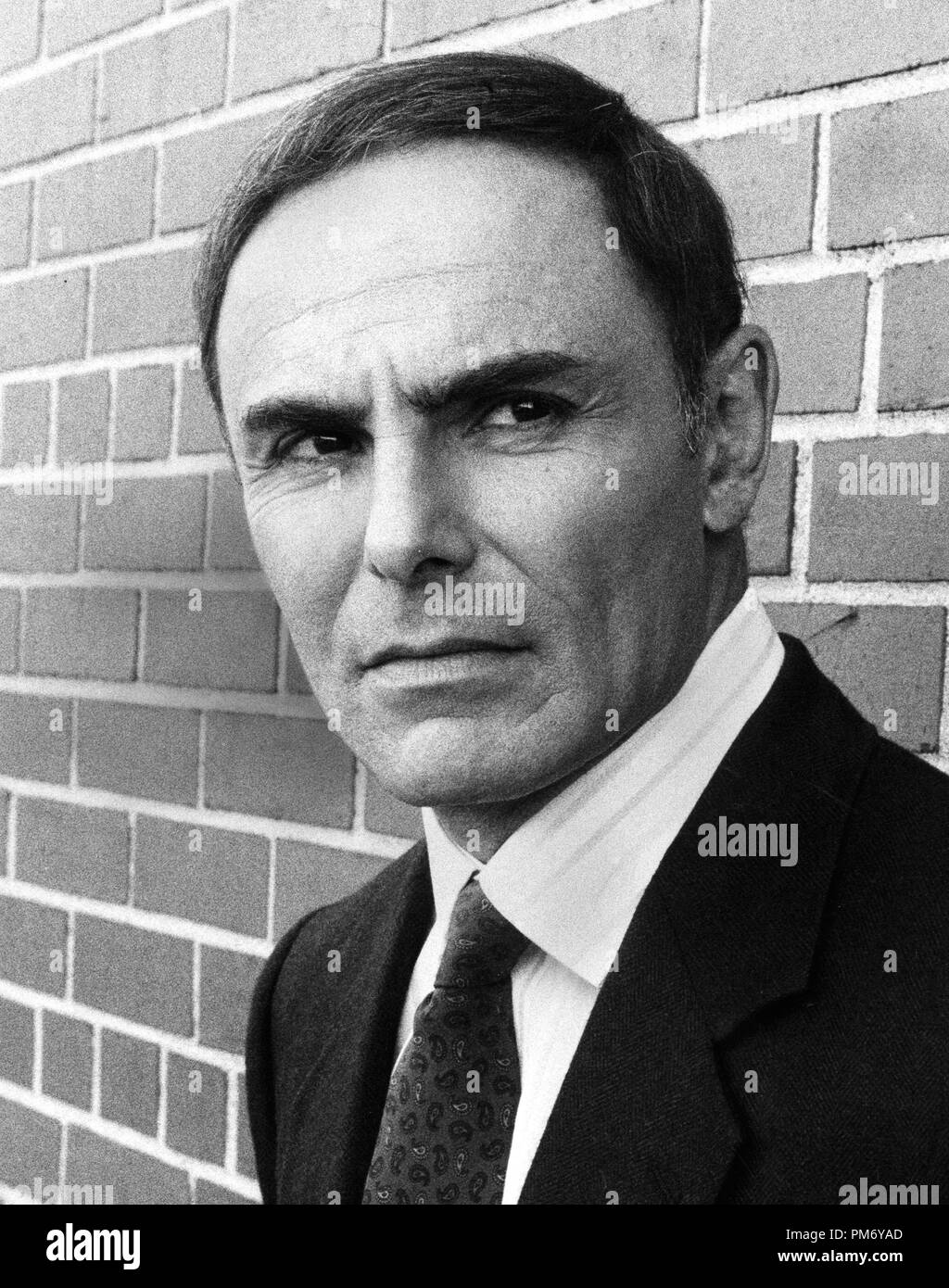 Studio Publicity STILL: John Saxon 1985 file Reference # 31202 1129THA Foto Stock