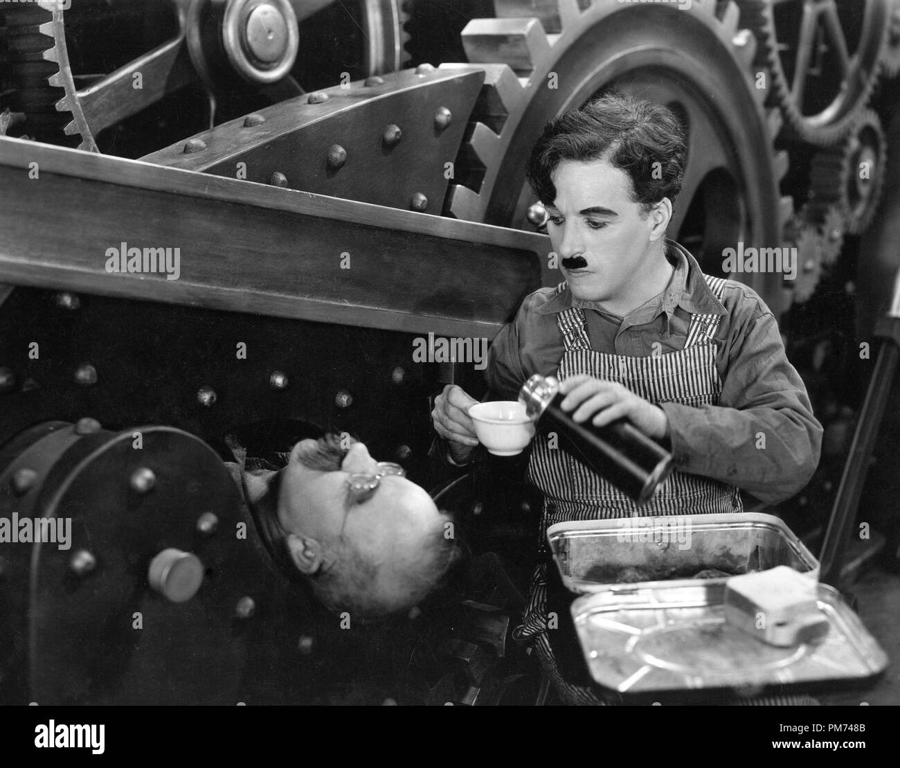 Charles Chaplin, 'Moderne Times' 1936 Riferimento File # 30928 067THA Foto Stock