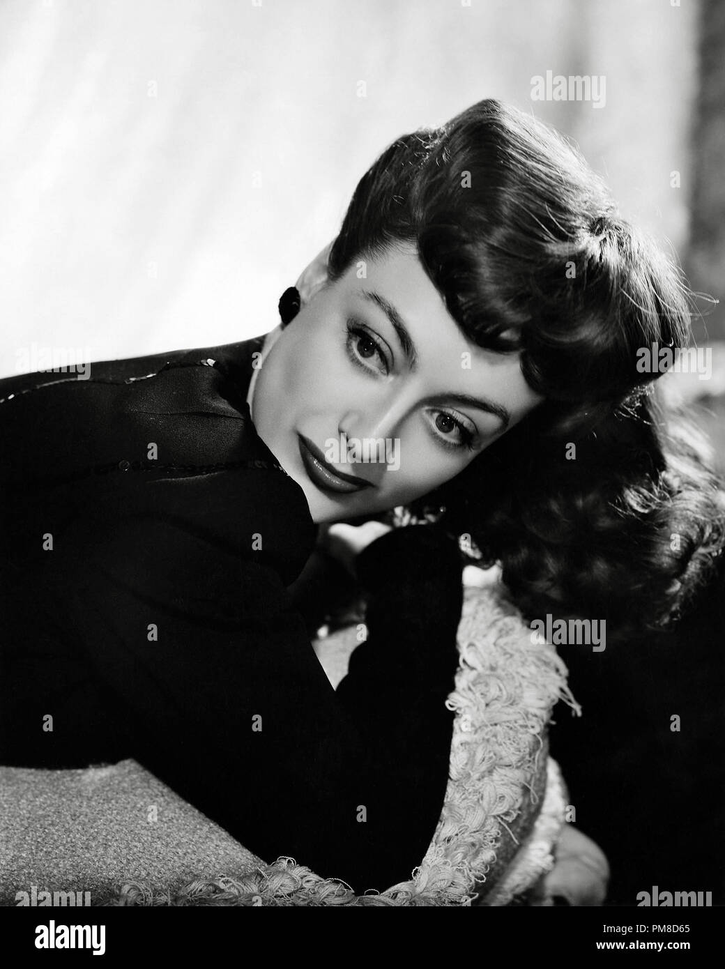 Joan Crawford, "al di sopra di ogni sospetto" 1943 MGM Riferimento File # 31955 322THA Foto Stock