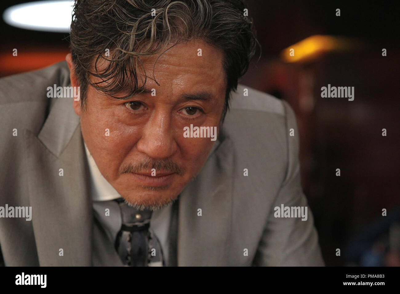 CHOI MIN-sik come la spietata il sig. Jang in "Lucy" Foto Stock