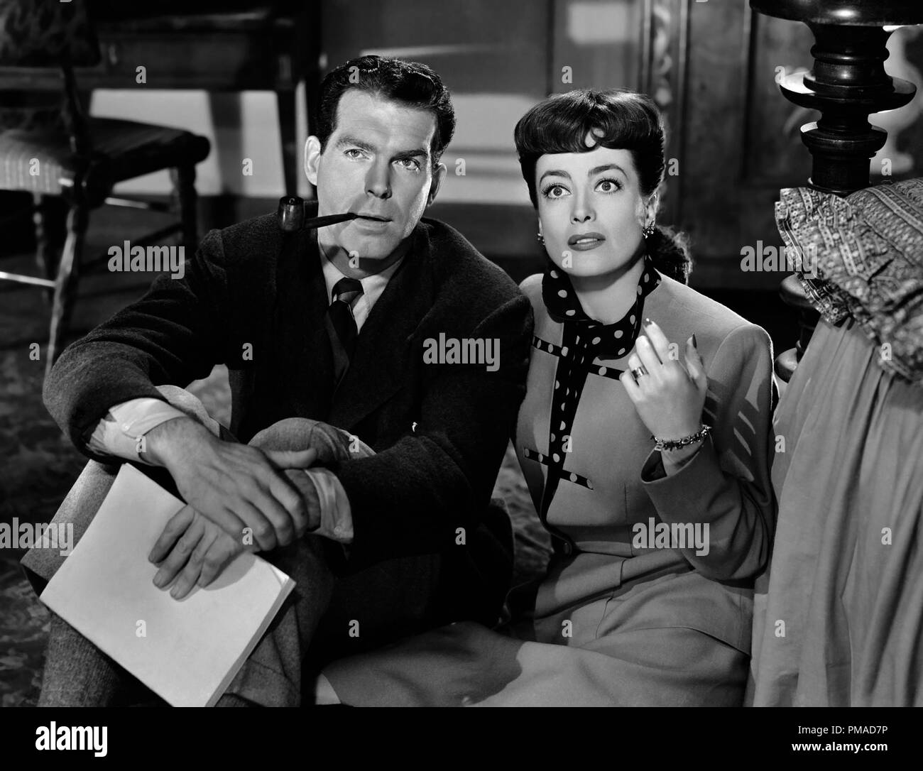 Fred MacMurray, Joan Crawford, "al di sopra di ogni sospetto", 1943 MGM Riferimento File # 32368 678THA Foto Stock