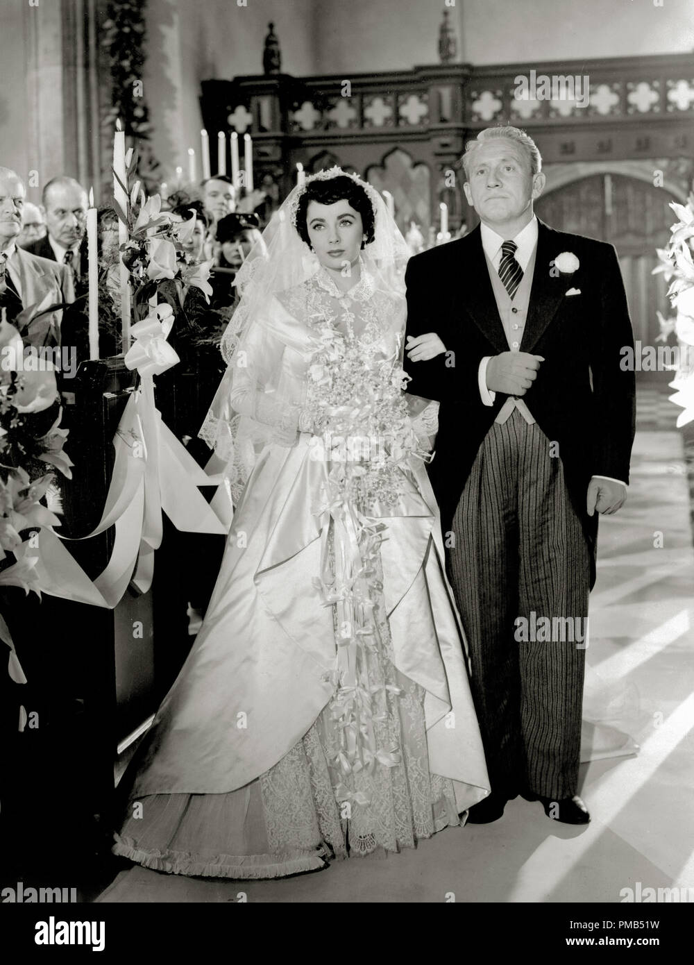 Spencer Tracy, Elizabeth Taylor, 'padre della sposa' 1950 MGM Riferimento  File # 33371 516THA Foto stock - Alamy