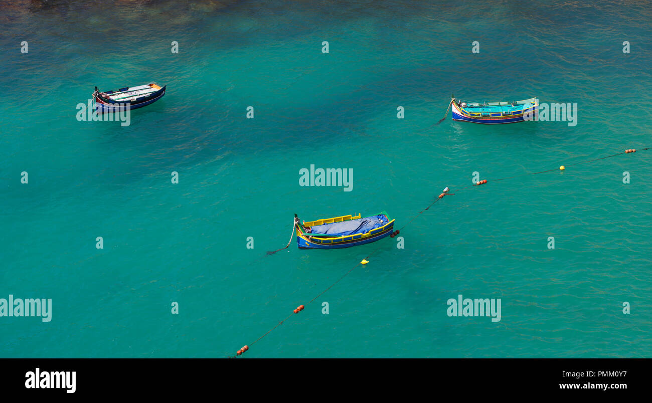 3 tradizionali barche da pesca (luzzu), Malta Foto Stock