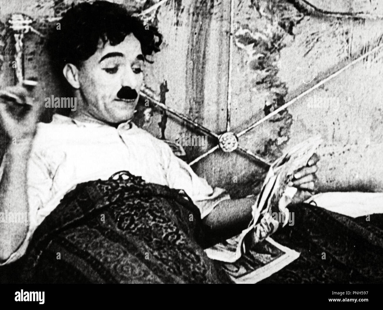 Pellicola originale titolo: il bambino. Titolo inglese: il bambino. Anno: 1921. Direttore: Charlie Chaplin. Stelle: Charlie Chaplin. Credito: prima nazionale / Album Foto Stock