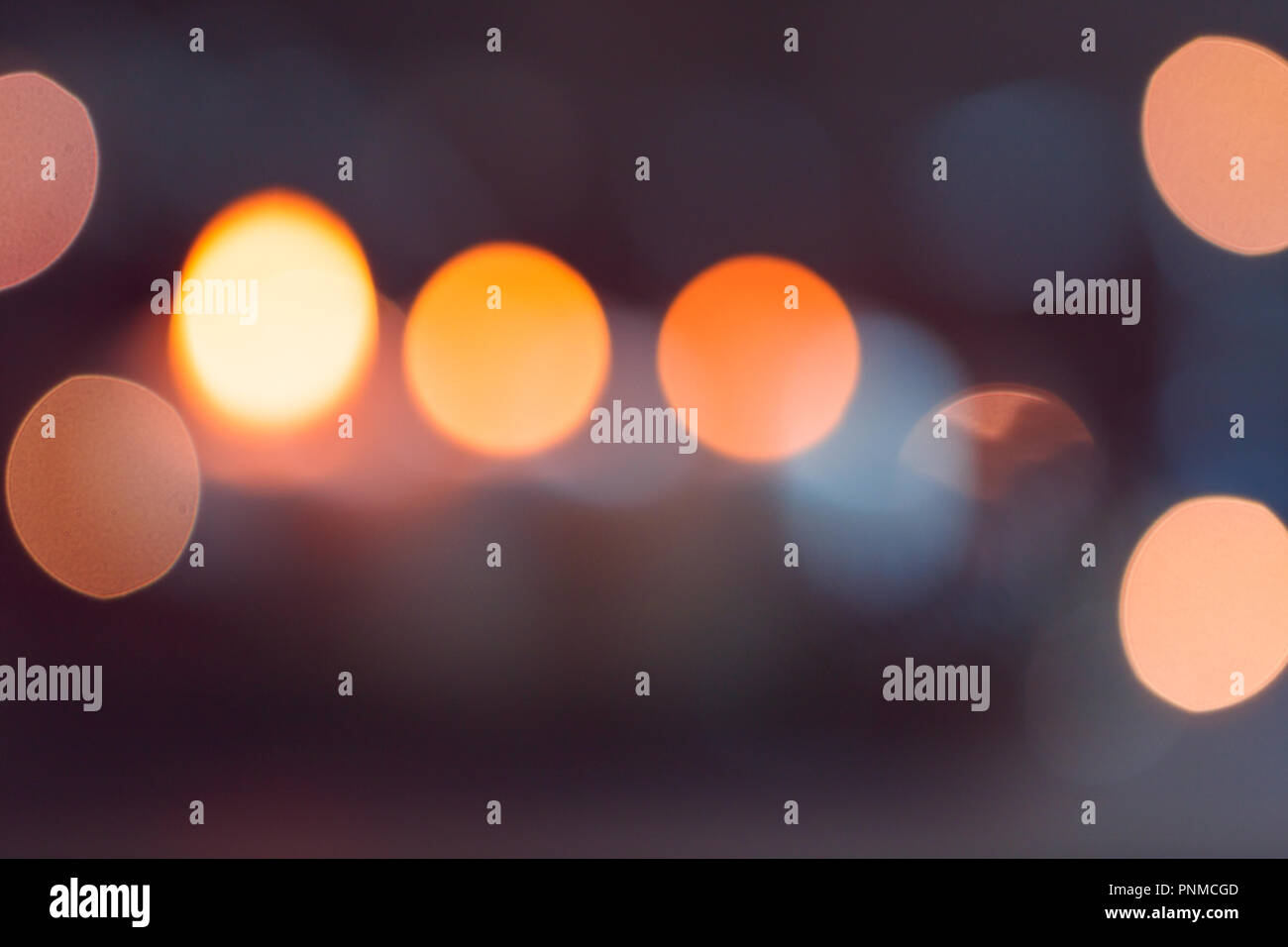 Luci sfocate di notte. Abstract circolare sfondo bokeh di fondo. Foto Stock