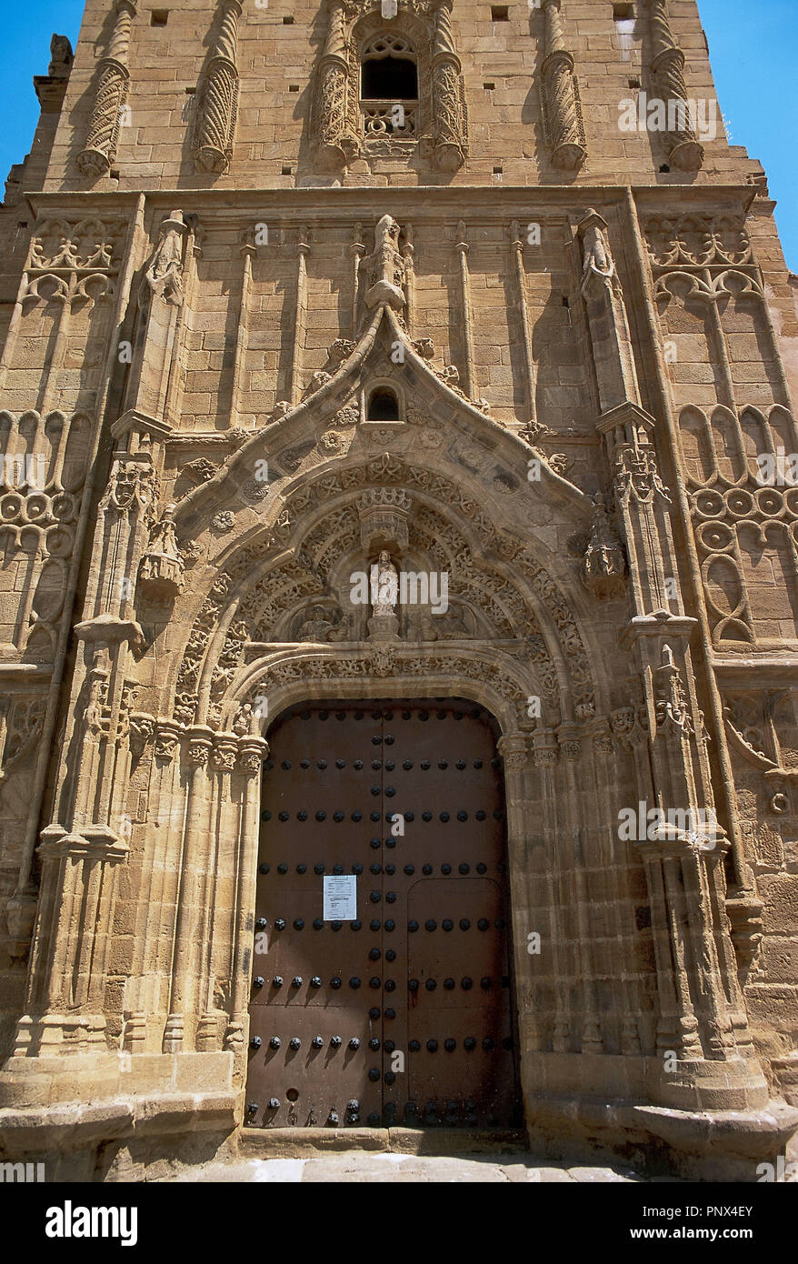 Spagna. Extremadura. Azuaga. Chiesa di Nuestra Senora de la Consolacion. 15th-16th. Isabelline stile gotico. Facada. Foto Stock