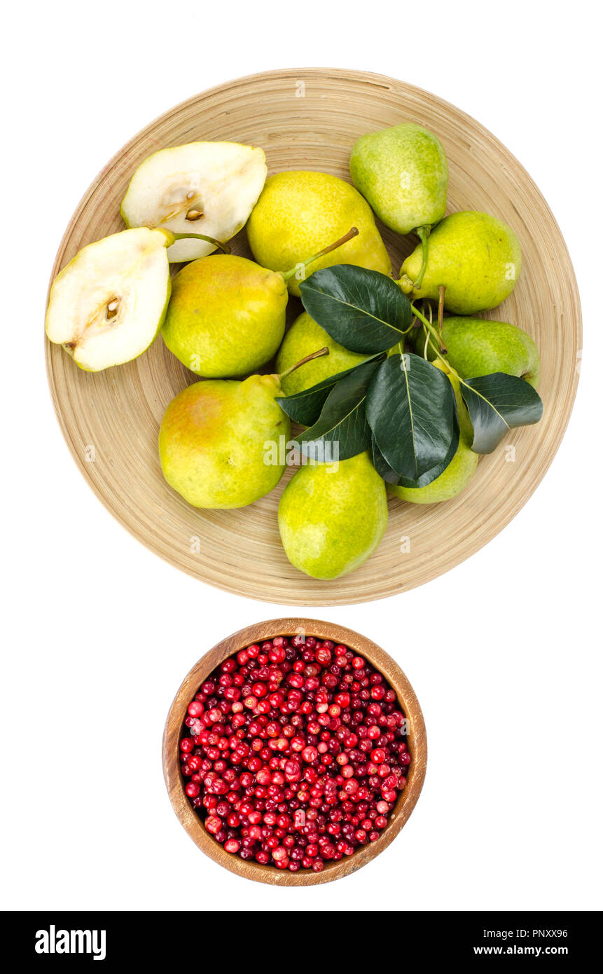 Mature pere dolci sul piatto di legno Foto Stock