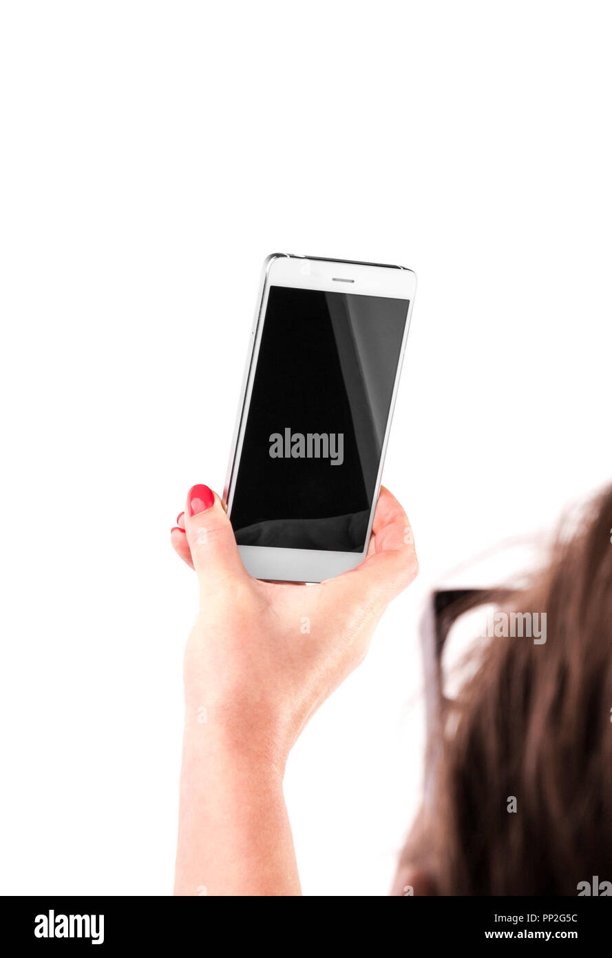 Femmina tenuta a mano e toccando un Mobile Smartphone Foto Stock