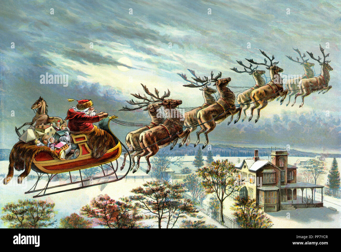 Babbo Natale e la sua renna offrendo regali di Natale Foto Stock