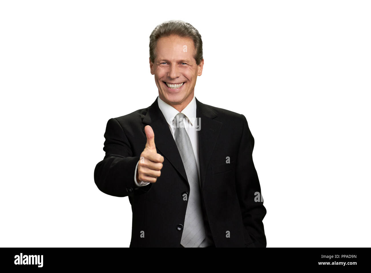 Ritratto di imprenditore gesticolando pollice in alto. Foto Stock