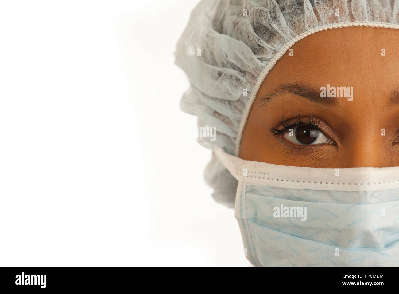 Stretto colpo di giovani africani chirurghi femmina faccia Foto Stock