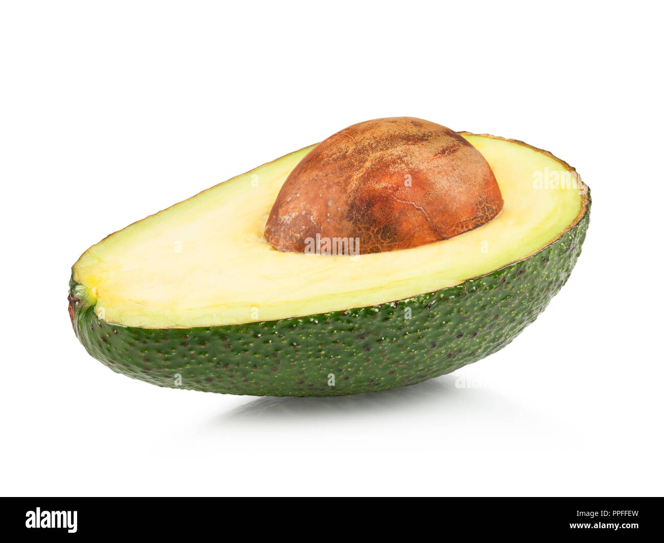 Semi maturi avocado isolati su sfondo bianco Foto Stock