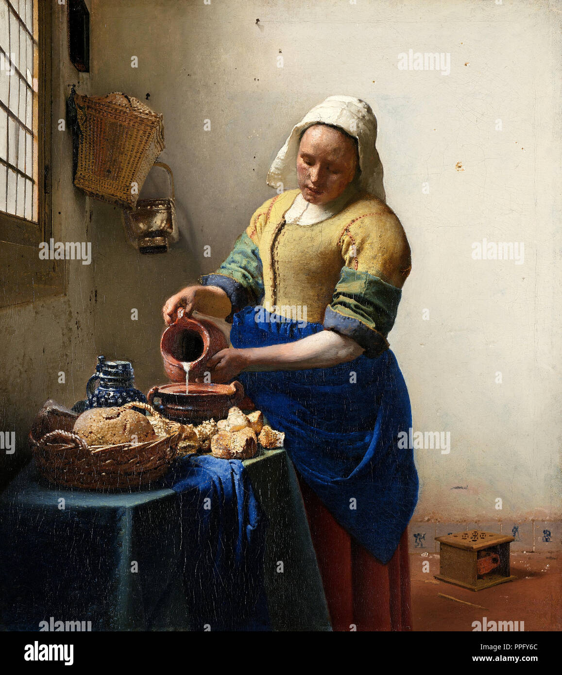 Johannes Vermeer - La Milkmaid. Circa 1660. Olio su tela. Rijksmuseum Amsterdam, Paesi Bassi. Foto Stock