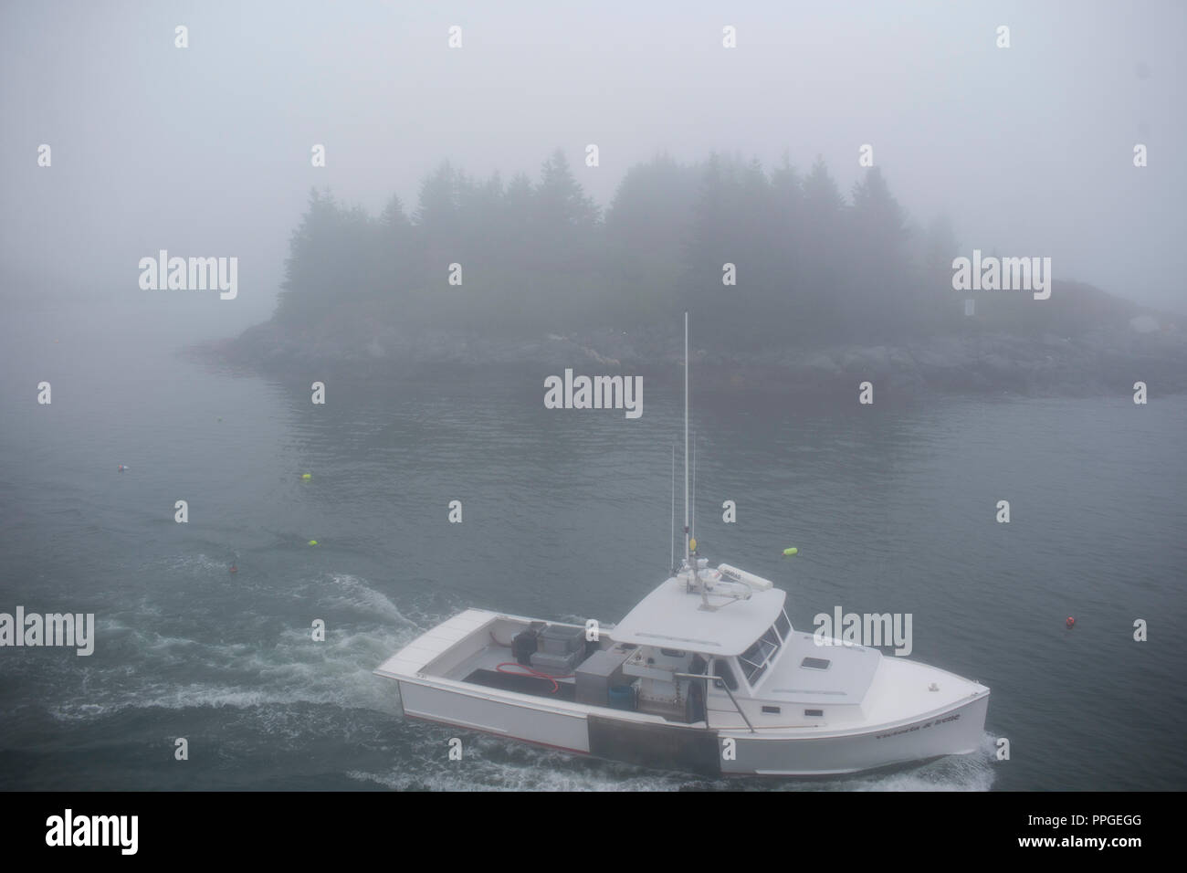 I pescatori di aragoste nelle loro barche sul isola di Vinalhaven, Maine. La comunità insulari in Penobscot Bay è uno dei più grandi per la pesca di aragoste in Foto Stock