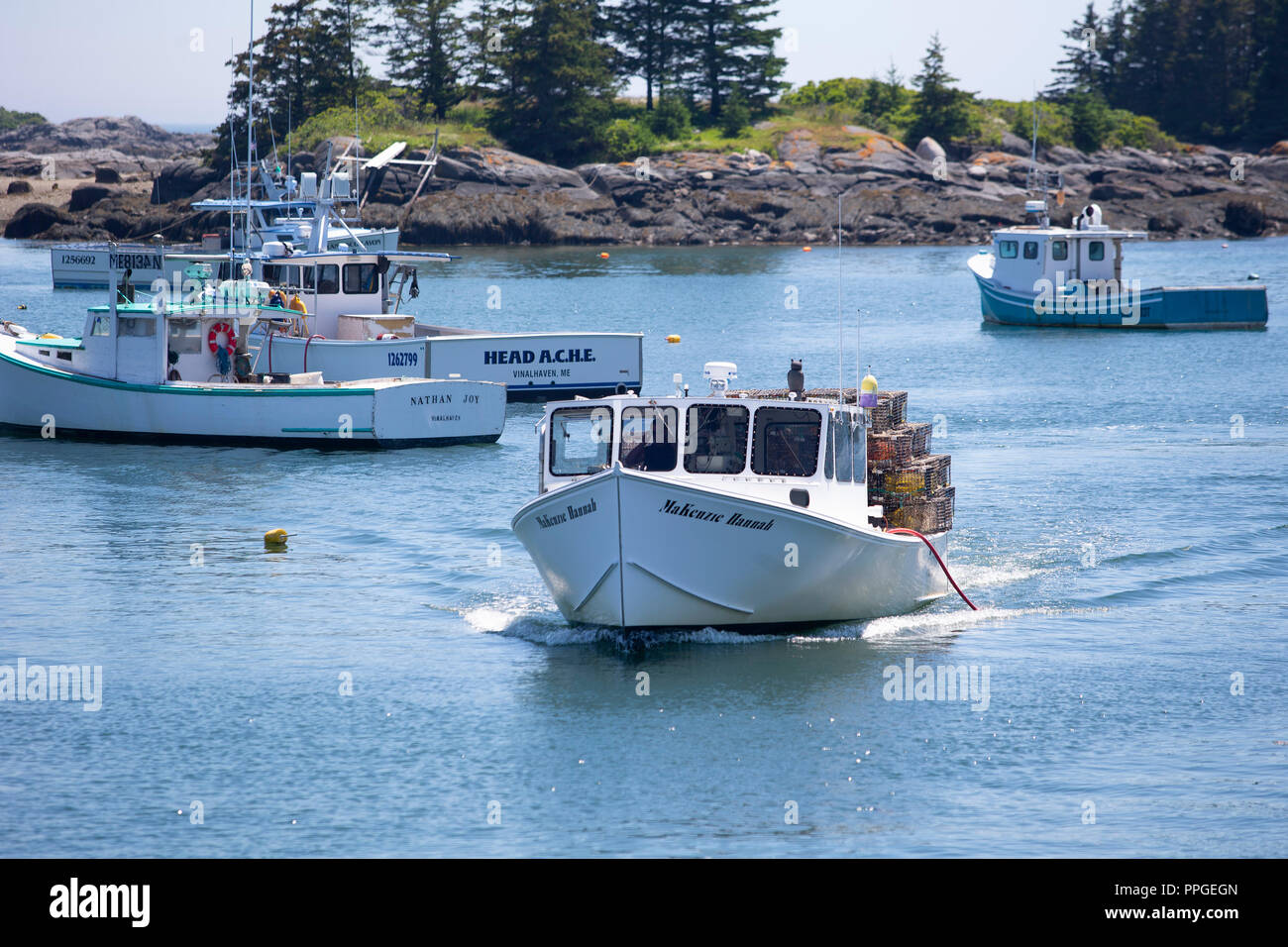 I pescatori di aragoste nelle loro barche sul isola di Vinalhaven, Maine. La comunità insulari in Penobscot Bay è uno dei più grandi per la pesca di aragoste in Foto Stock