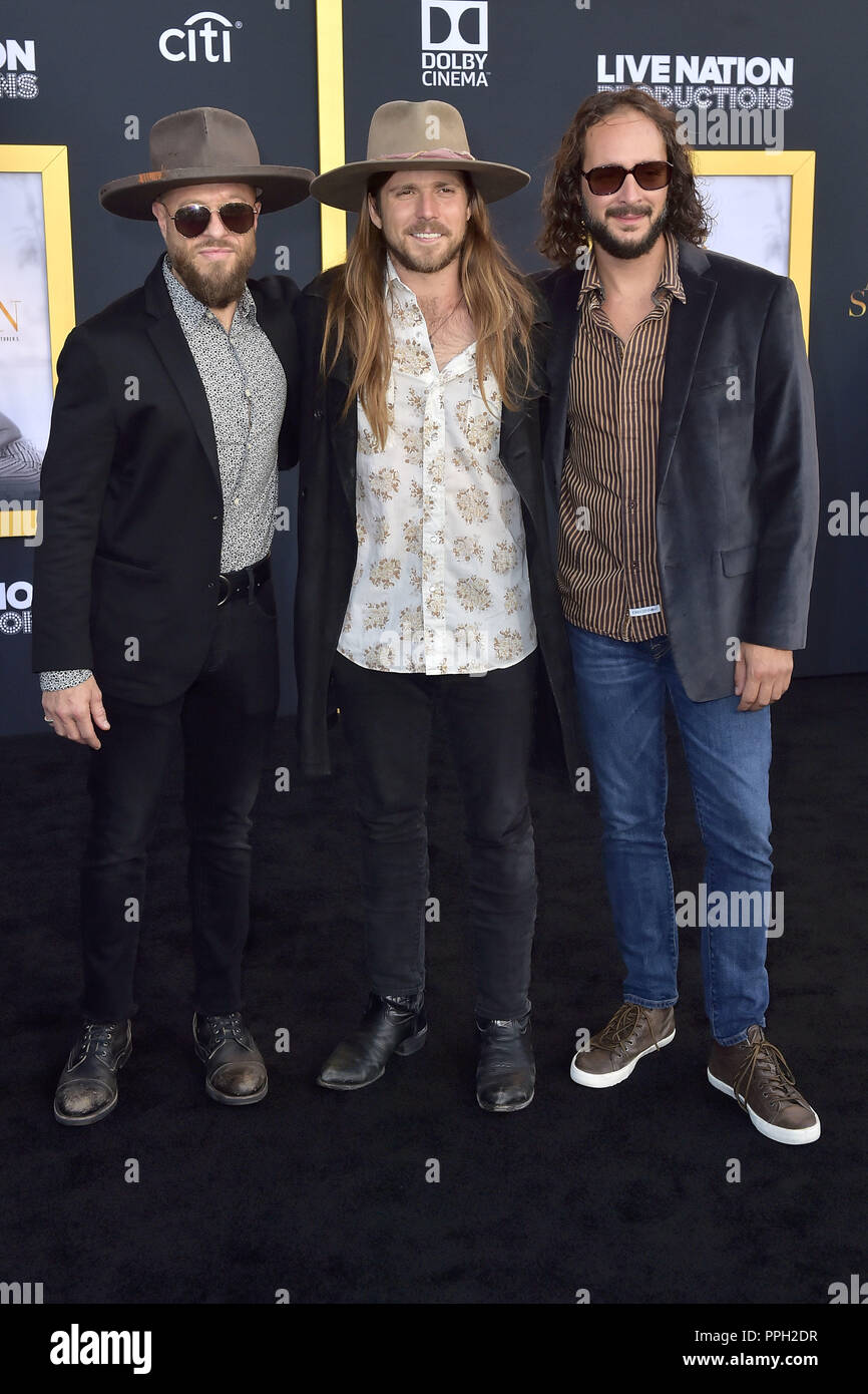 Los Angeles, California. 24Sep, 2018. Corey McCormick, Lukas Nelson e Anthony LoGerfo frequentando il 'è nata una stella' premiere presso lo Shrine Auditorium il 24 settembre 2018 a Los Angeles, California. | Utilizzo di credito in tutto il mondo: dpa/Alamy Live News Foto Stock