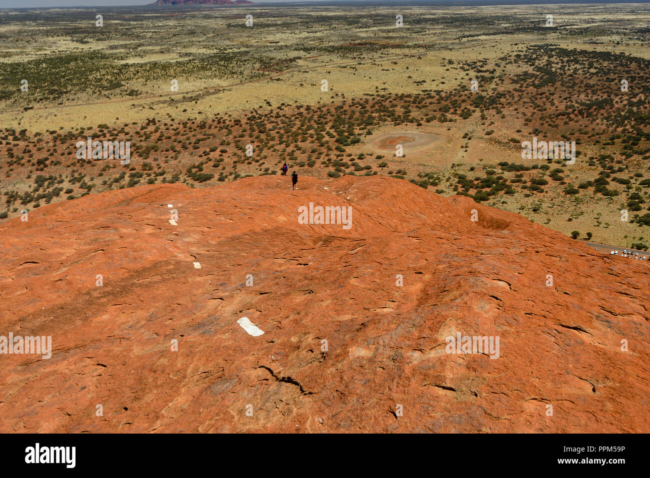 Climbing Uluru Ayers Rock, Uluru Kata Tjutas National Park, Australia Foto Stock