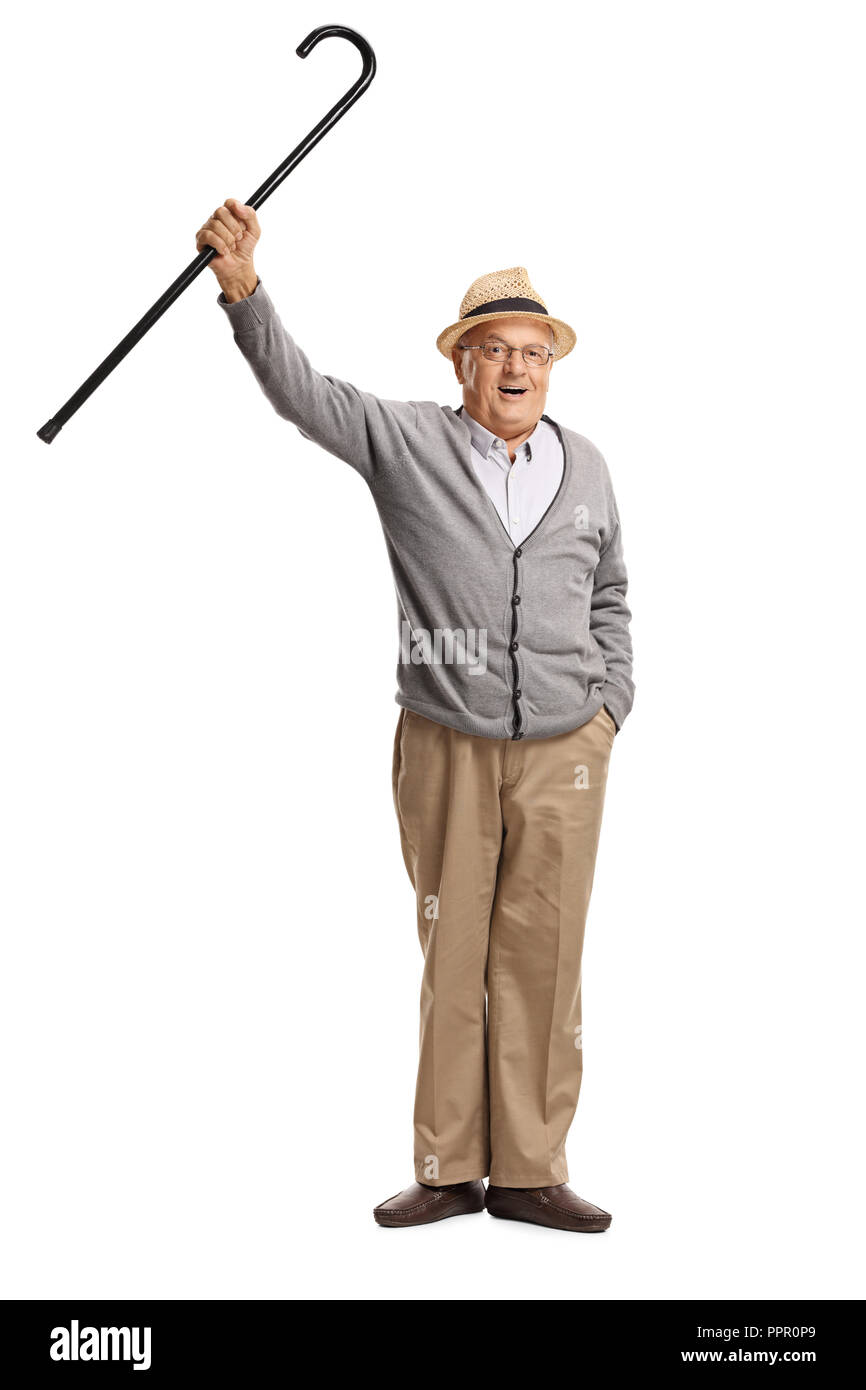 A piena lunghezza Ritratto di un gioioso senior con una canna isolati su sfondo bianco Foto Stock