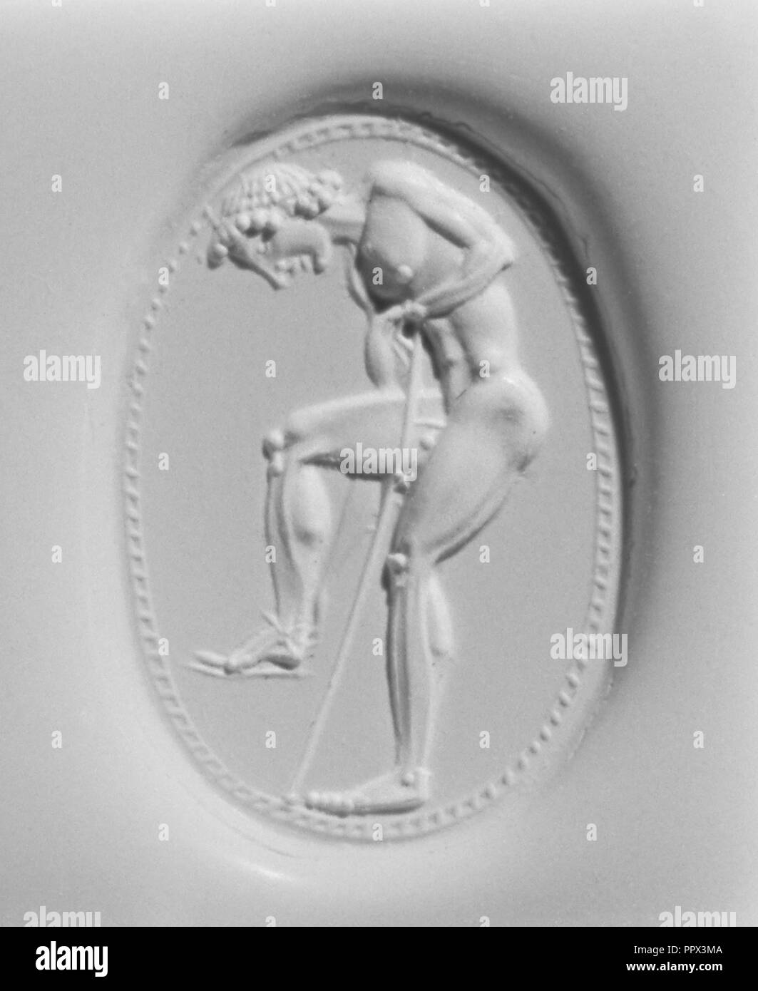 Gemma incisa con un atleta regolando il suo sandalo; attribuita a Epimenes, greco, attivo circa 500 A.C., Cicladi Grecia Foto Stock