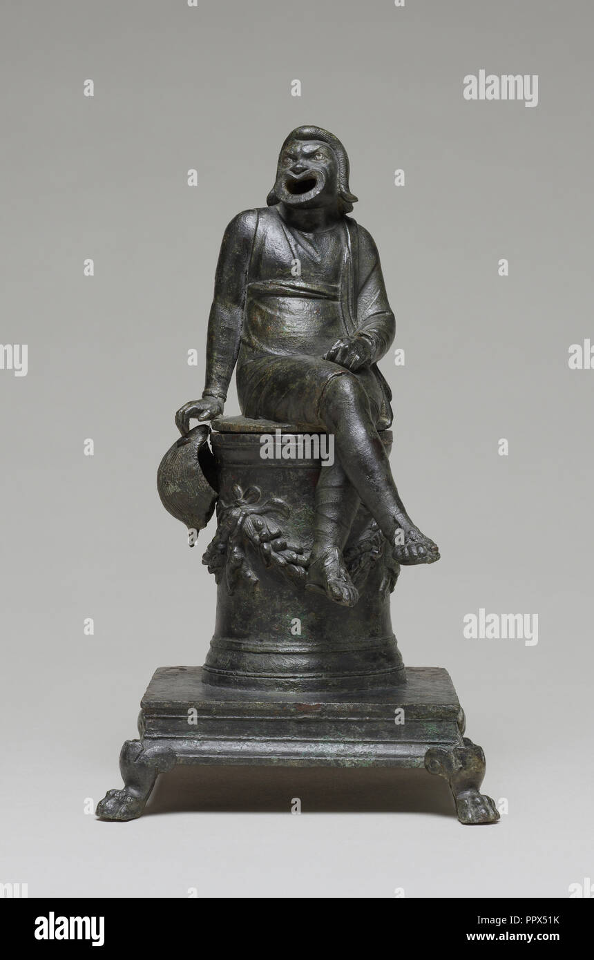 Bruciatore di incenso conformata come un attore comico seduto su un altare; Impero Romano; prima metà del primo secolo; bronzo con inserto in argento Foto Stock