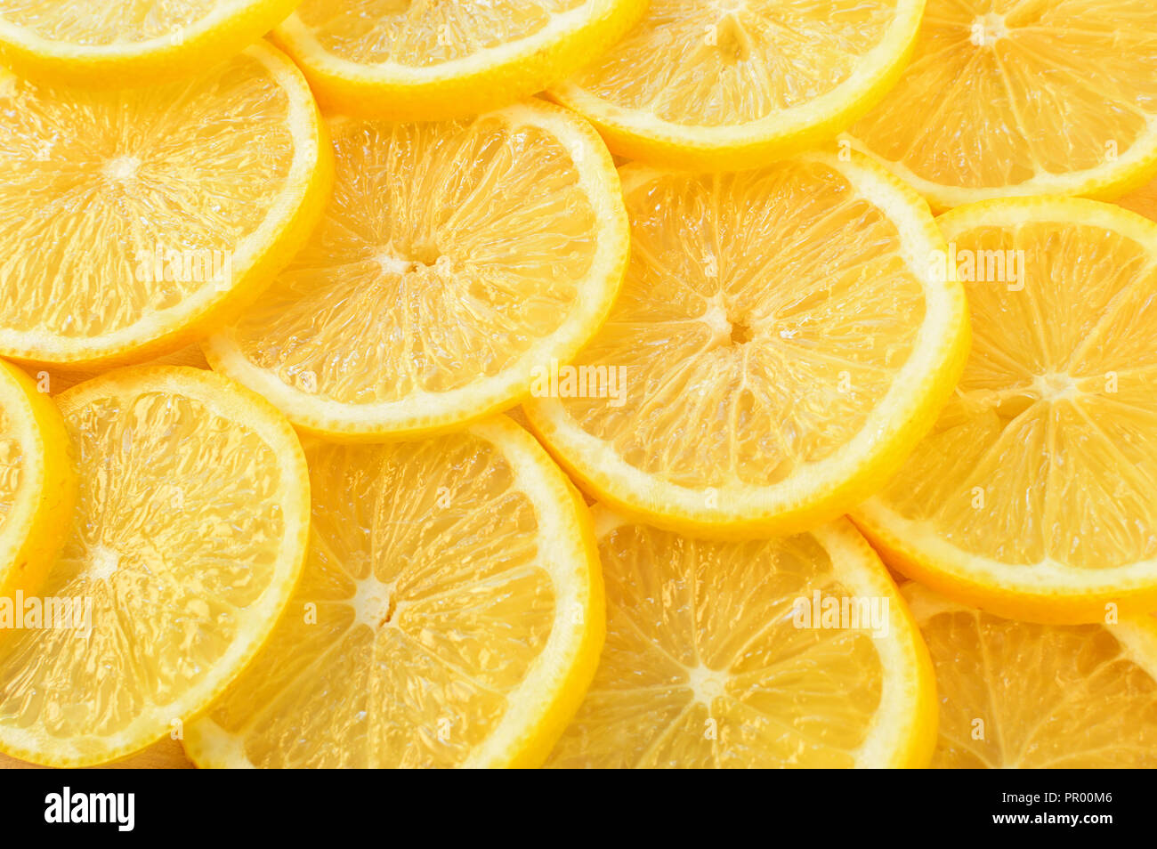 Sfondo di fette di limone. La vista dall'alto Foto Stock