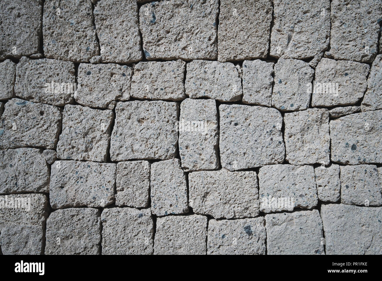 Muro di pietra naturale di sfondo - pietre di roccia Foto Stock