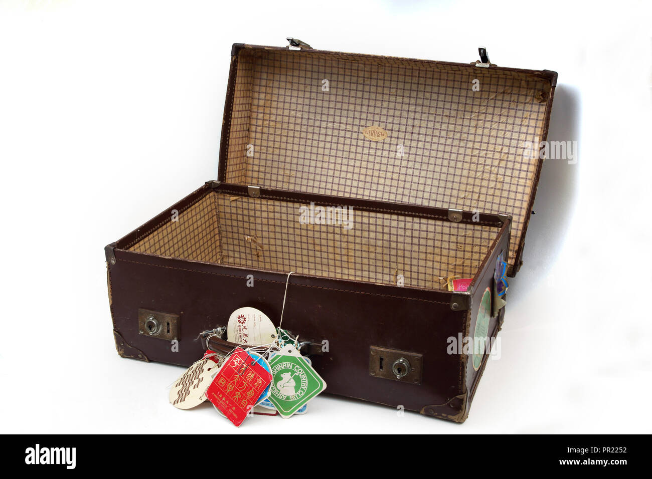 Pelle Vintage Everlasta valigia con etichette di viaggio sulla maniglia Foto Stock