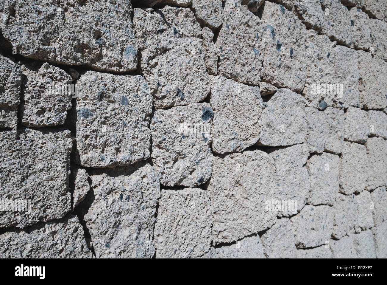 Muro di pietra naturale di sfondo - pietre di roccia Foto Stock