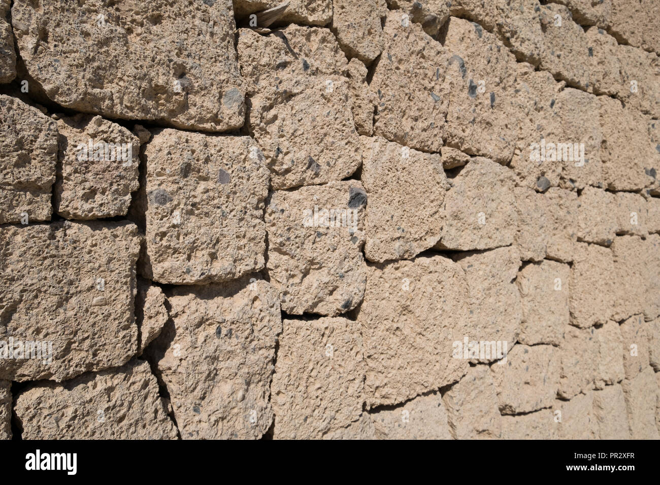 L'ignimbrite muro di pietra - muro di pietra naturale sfondo, Foto Stock